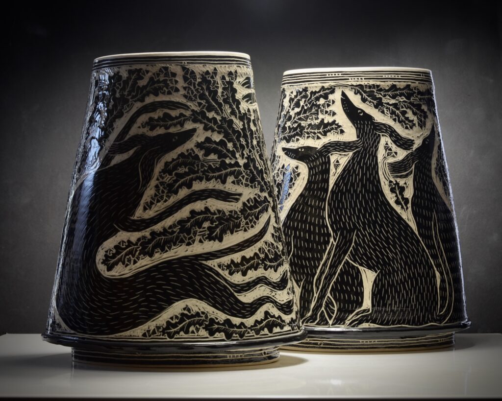 Simon Olley pair Swirling Black Dog Vases